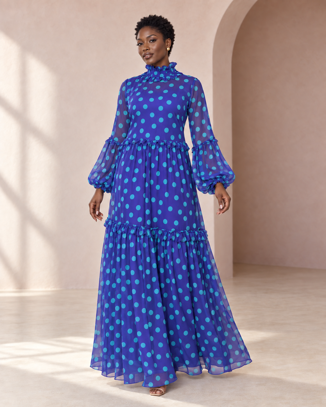 Blue and violet polka-dot tiered maxi dress on a model